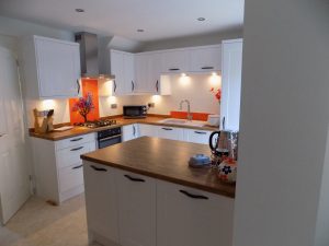 Glass splash backs with under cabinet lighting